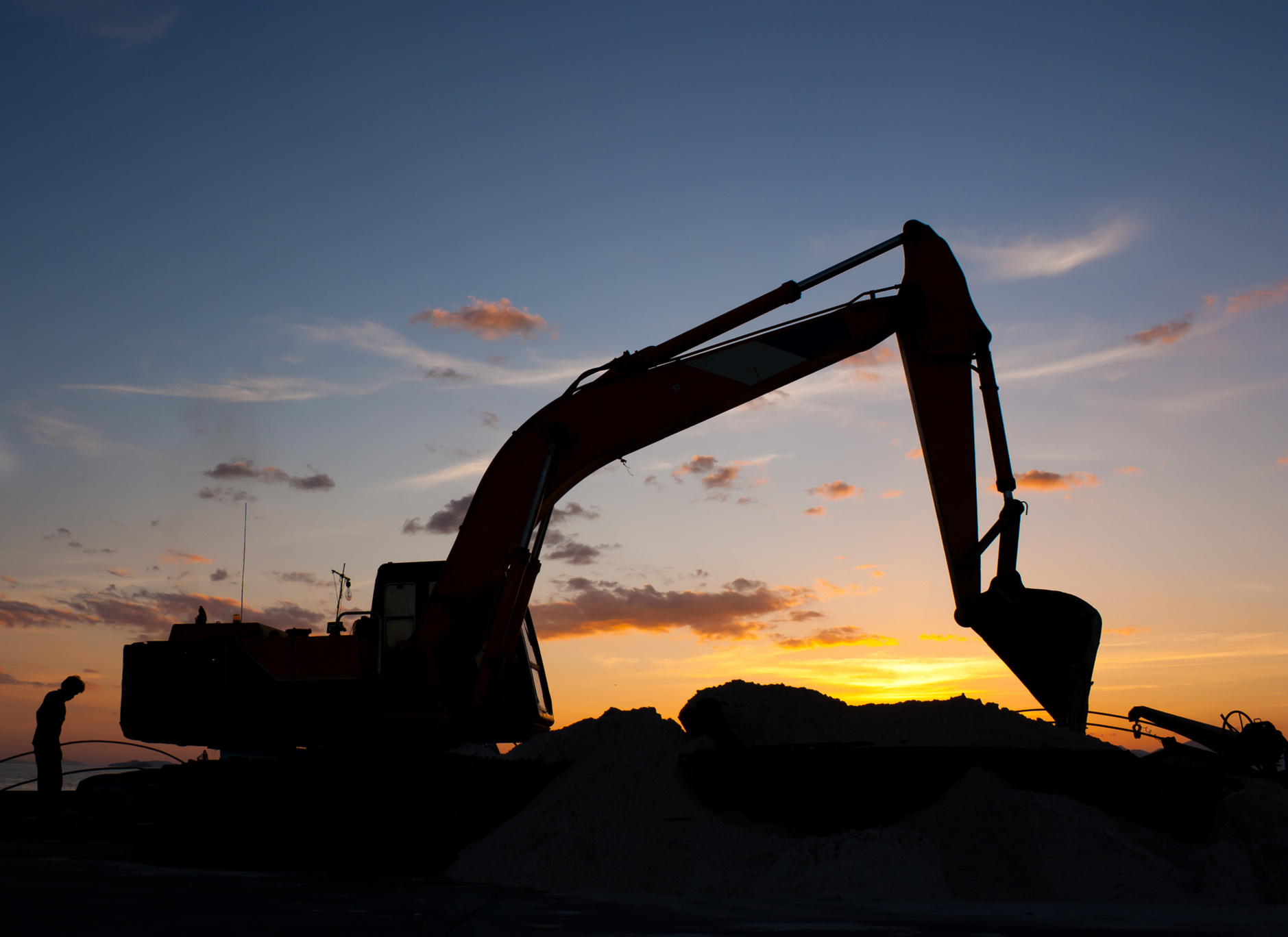 excavator machine doing earthmoving